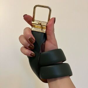 Green belt with gold hardware